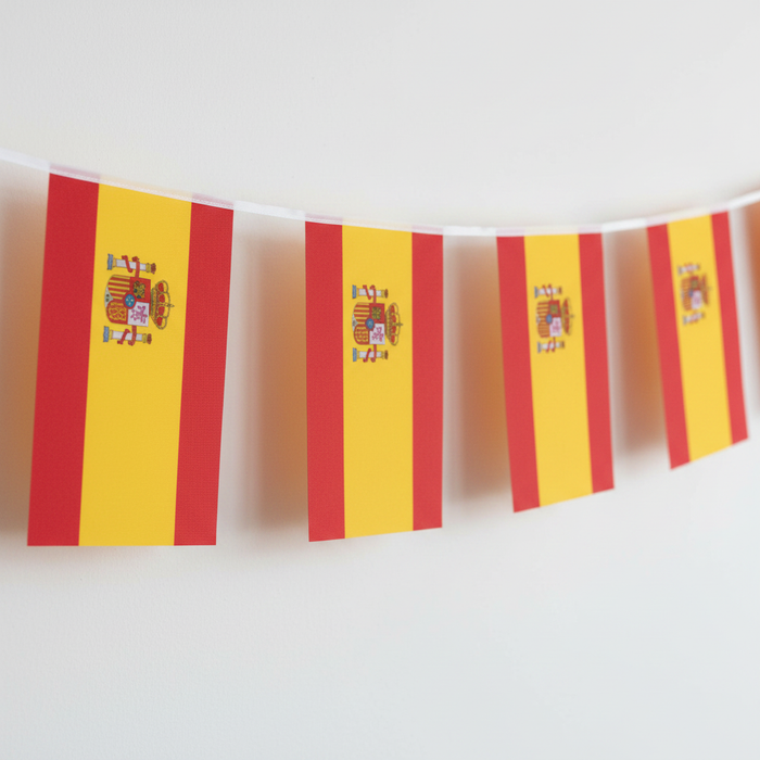 Spanish Flag Bunting Hanging Against Wall